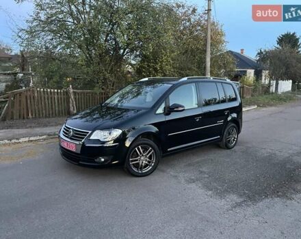 Черный Фольксваген Туран, объемом двигателя 1.4 л и пробегом 238 тыс. км за 7888 $, фото 210 на Automoto.ua