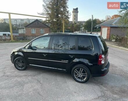 Черный Фольксваген Туран, объемом двигателя 1.4 л и пробегом 238 тыс. км за 7888 $, фото 79 на Automoto.ua