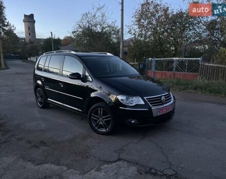 Черный Фольксваген Туран, объемом двигателя 1.4 л и пробегом 238 тыс. км за 7888 $, фото 3 на Automoto.ua