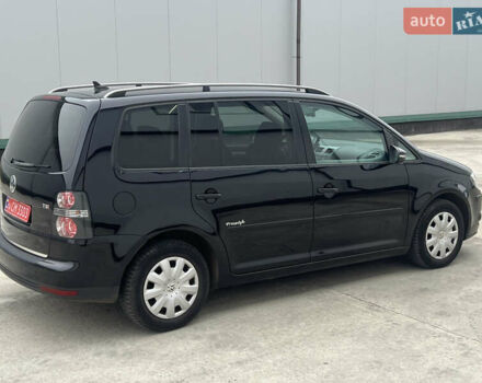 Черный Фольксваген Туран, объемом двигателя 1.4 л и пробегом 213 тыс. км за 8100 $, фото 2 на Automoto.ua