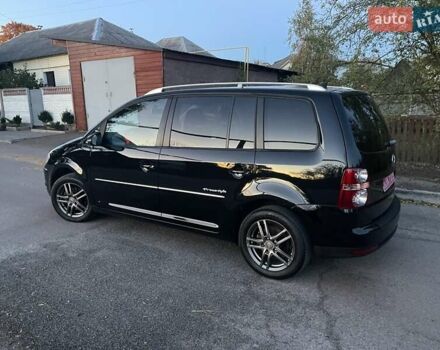 Черный Фольксваген Туран, объемом двигателя 1.4 л и пробегом 238 тыс. км за 7888 $, фото 214 на Automoto.ua