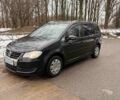 Чорний Фольксваген Туран, об'ємом двигуна 1.4 л та пробігом 220 тис. км за 7492 $, фото 1 на Automoto.ua