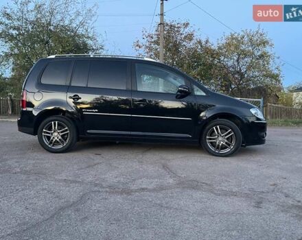 Черный Фольксваген Туран, объемом двигателя 1.4 л и пробегом 238 тыс. км за 7888 $, фото 200 на Automoto.ua