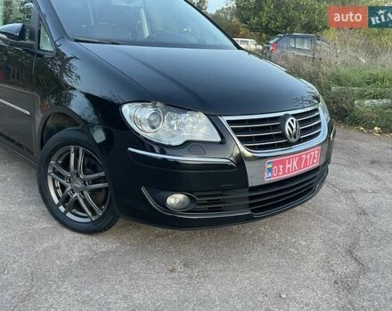 Черный Фольксваген Туран, объемом двигателя 1.4 л и пробегом 238 тыс. км за 7888 $, фото 92 на Automoto.ua