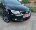 Черный Фольксваген Туран, объемом двигателя 1.4 л и пробегом 238 тыс. км за 7888 $, фото 92 на Automoto.ua