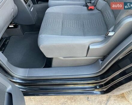 Черный Фольксваген Туран, объемом двигателя 1.4 л и пробегом 238 тыс. км за 7888 $, фото 132 на Automoto.ua