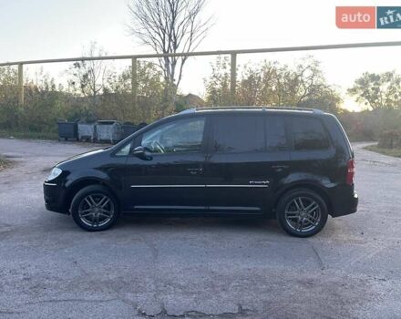 Черный Фольксваген Туран, объемом двигателя 1.4 л и пробегом 238 тыс. км за 7888 $, фото 114 на Automoto.ua