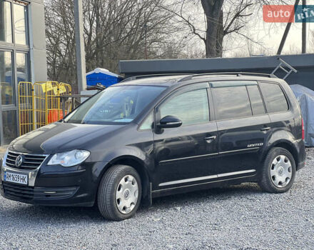 Черный Фольксваген Туран, объемом двигателя 1.4 л и пробегом 290 тыс. км за 6900 $, фото 1 на Automoto.ua