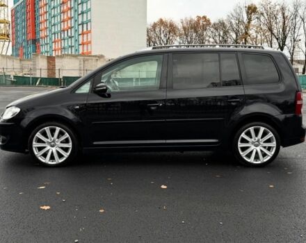 Черный Фольксваген Туран, объемом двигателя 2 л и пробегом 260 тыс. км за 9950 $, фото 1 на Automoto.ua
