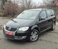 Чорний Фольксваген Туран, об'ємом двигуна 1.4 л та пробігом 248 тис. км за 7699 $, фото 1 на Automoto.ua