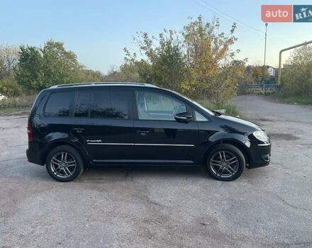 Черный Фольксваген Туран, объемом двигателя 1.4 л и пробегом 238 тыс. км за 7888 $, фото 97 на Automoto.ua