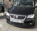 Чорний Фольксваген Туран, об'ємом двигуна 1.97 л та пробігом 264 тис. км за 8900 $, фото 1 на Automoto.ua