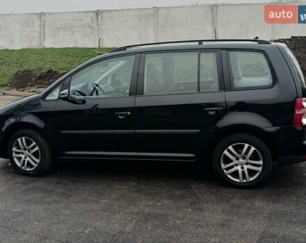 Черный Фольксваген Туран, объемом двигателя 1.6 л и пробегом 249 тыс. км за 7999 $, фото 11 на Automoto.ua