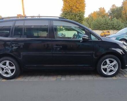 Чорний Фольксваген Туран, об'ємом двигуна 1.6 л та пробігом 258 тис. км за 10700 $, фото 3 на Automoto.ua