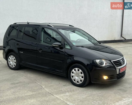 Черный Фольксваген Туран, объемом двигателя 1.4 л и пробегом 213 тыс. км за 8100 $, фото 32 на Automoto.ua