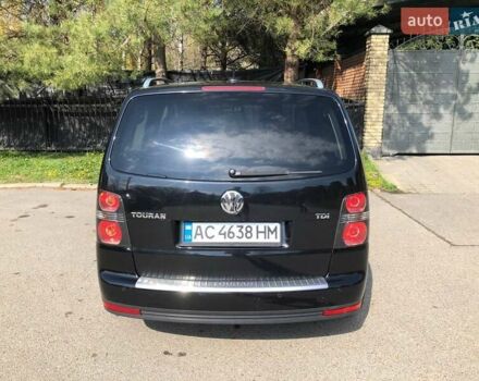 Черный Фольксваген Туран, объемом двигателя 1.9 л и пробегом 294 тыс. км за 7400 $, фото 4 на Automoto.ua