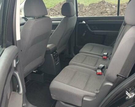 Черный Фольксваген Туран, объемом двигателя 1.6 л и пробегом 249 тыс. км за 7999 $, фото 29 на Automoto.ua