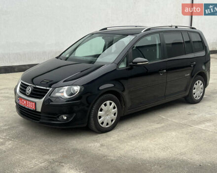 Черный Фольксваген Туран, объемом двигателя 1.4 л и пробегом 213 тыс. км за 8100 $, фото 4 на Automoto.ua