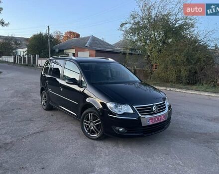 Черный Фольксваген Туран, объемом двигателя 1.4 л и пробегом 238 тыс. км за 7888 $, фото 198 на Automoto.ua
