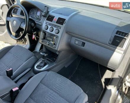 Черный Фольксваген Туран, объемом двигателя 1.4 л и пробегом 238 тыс. км за 7888 $, фото 266 на Automoto.ua