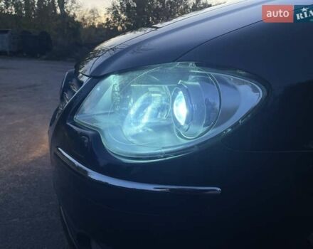 Черный Фольксваген Туран, объемом двигателя 1.4 л и пробегом 238 тыс. км за 7888 $, фото 105 на Automoto.ua