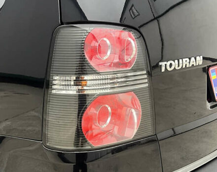 Черный Фольксваген Туран, объемом двигателя 1.4 л и пробегом 213 тыс. км за 8100 $, фото 14 на Automoto.ua