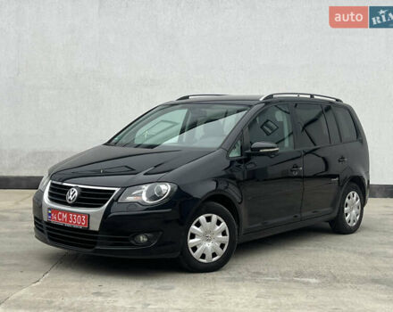 Черный Фольксваген Туран, объемом двигателя 1.4 л и пробегом 213 тыс. км за 8100 $, фото 19 на Automoto.ua