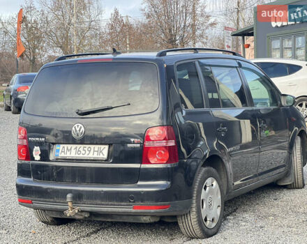 Черный Фольксваген Туран, объемом двигателя 1.4 л и пробегом 290 тыс. км за 6900 $, фото 2 на Automoto.ua