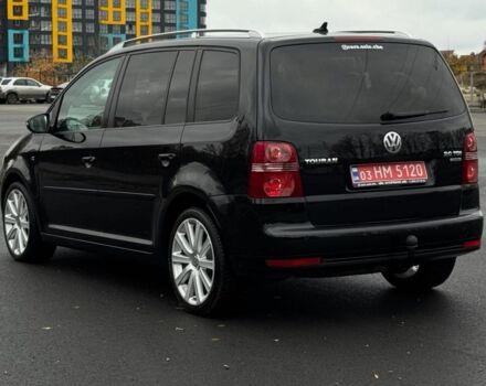 Черный Фольксваген Туран, объемом двигателя 2 л и пробегом 260 тыс. км за 9950 $, фото 2 на Automoto.ua