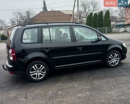 Черный Фольксваген Туран, объемом двигателя 1.6 л и пробегом 249 тыс. км за 7999 $, фото 22 на Automoto.ua