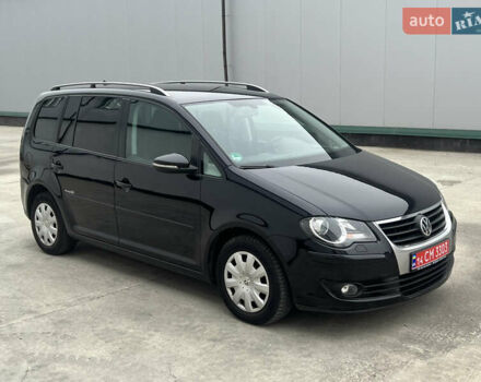 Черный Фольксваген Туран, объемом двигателя 1.4 л и пробегом 213 тыс. км за 8100 $, фото 3 на Automoto.ua