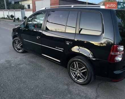 Черный Фольксваген Туран, объемом двигателя 1.4 л и пробегом 238 тыс. км за 7888 $, фото 216 на Automoto.ua