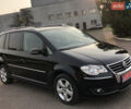 Черный Фольксваген Туран, объемом двигателя 2 л и пробегом 206 тыс. км за 9999 $, фото 1 на Automoto.ua