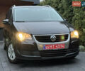 Черный Фольксваген Туран, объемом двигателя 1.6 л и пробегом 191 тыс. км за 7900 $, фото 2 на Automoto.ua