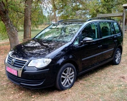 Чорний Фольксваген Туран, об'ємом двигуна 1.6 л та пробігом 249 тис. км за 8499 $, фото 1 на Automoto.ua