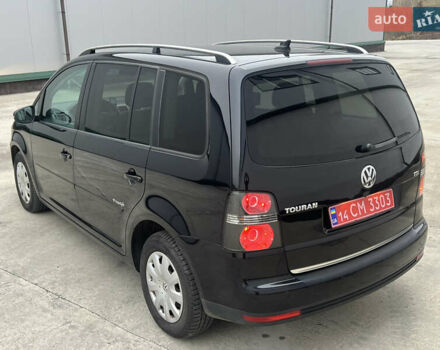 Черный Фольксваген Туран, объемом двигателя 1.4 л и пробегом 213 тыс. км за 8100 $, фото 7 на Automoto.ua