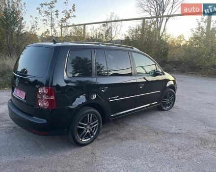 Черный Фольксваген Туран, объемом двигателя 1.4 л и пробегом 238 тыс. км за 7888 $, фото 102 на Automoto.ua