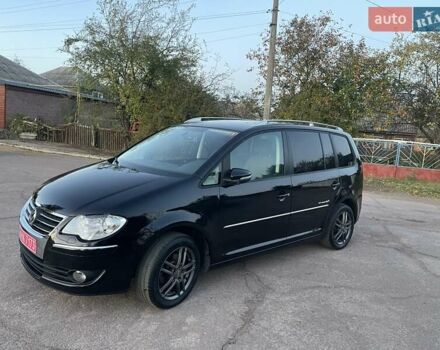 Черный Фольксваген Туран, объемом двигателя 1.4 л и пробегом 238 тыс. км за 7888 $, фото 86 на Automoto.ua