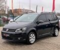 Черный Фольксваген Туран, объемом двигателя 2 л и пробегом 283 тыс. км за 12555 $, фото 1 на Automoto.ua