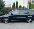 Черный Фольксваген Туран, объемом двигателя 1.97 л и пробегом 276 тыс. км за 12990 $, фото 1 на Automoto.ua