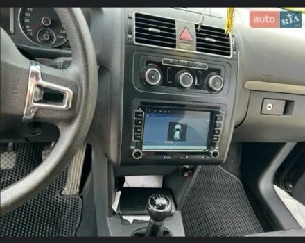 Черный Фольксваген Туран, объемом двигателя 1.4 л и пробегом 223 тыс. км за 7900 $, фото 4 на Automoto.ua