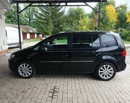 Черный Фольксваген Туран, объемом двигателя 1.98 л и пробегом 255 тыс. км за 12400 $, фото 29 на Automoto.ua