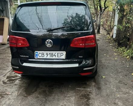 Черный Фольксваген Туран, объемом двигателя 1.4 л и пробегом 175 тыс. км за 7500 $, фото 1 на Automoto.ua