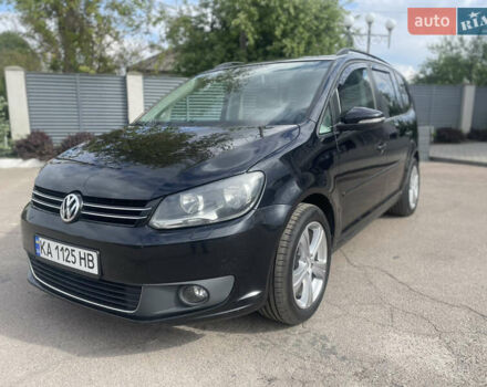 Черный Фольксваген Туран, объемом двигателя 1.39 л и пробегом 236 тыс. км за 8200 $, фото 1 на Automoto.ua