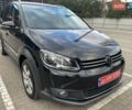 Черный Фольксваген Туран, объемом двигателя 1.4 л и пробегом 252 тыс. км за 9300 $, фото 1 на Automoto.ua