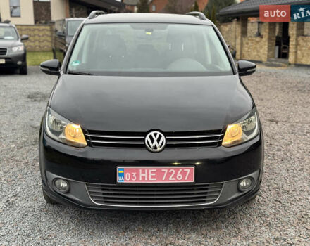 Черный Фольксваген Туран, объемом двигателя 2 л и пробегом 204 тыс. км за 11300 $, фото 1 на Automoto.ua