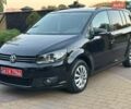 Чорний Фольксваген Туран, об'ємом двигуна 1.6 л та пробігом 256 тис. км за 8999 $, фото 1 на Automoto.ua