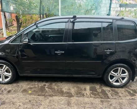 Черный Фольксваген Туран, объемом двигателя 1.4 л и пробегом 175 тыс. км за 7500 $, фото 2 на Automoto.ua