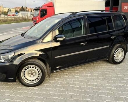 Черный Фольксваген Туран, объемом двигателя 1.6 л и пробегом 256 тыс. км за 8999 $, фото 2 на Automoto.ua