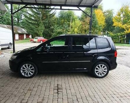 Черный Фольксваген Туран, объемом двигателя 1.98 л и пробегом 255 тыс. км за 12400 $, фото 26 на Automoto.ua